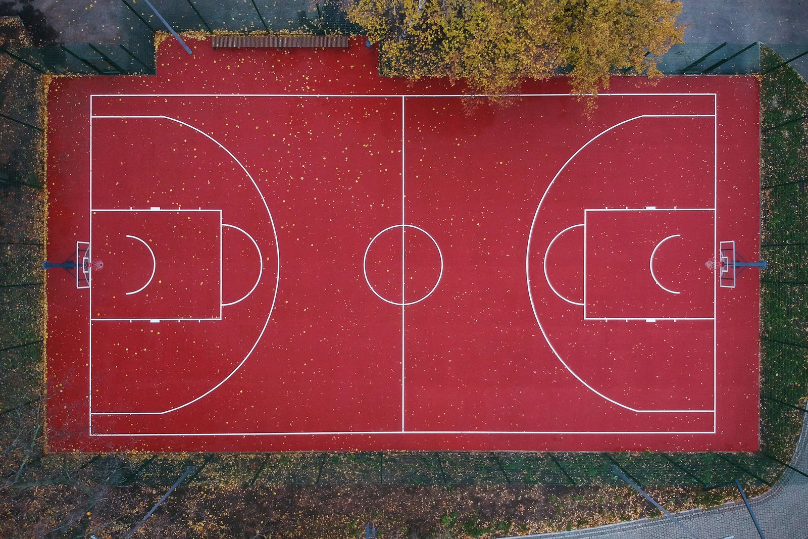 aerial-top-view-of-the-deserted-basketball-court-2023-11-27-05-24-57-utc