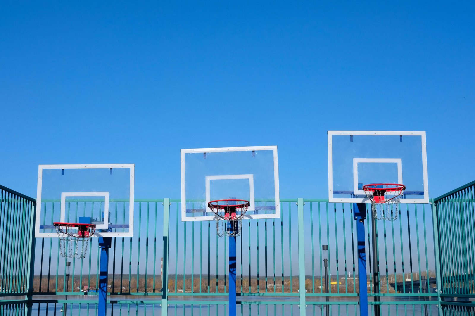 basketball-hoops-with-chains-on-the-playground-2023-11-27-05-15-58-utc