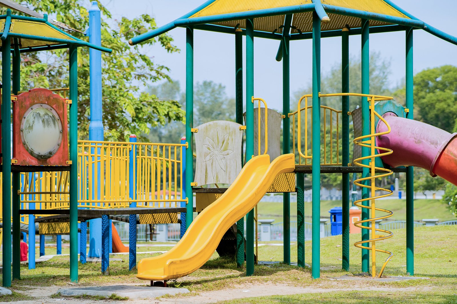 empty-colourful-playground-in-a-sunny-day-2023-11-27-05-13-37-utc