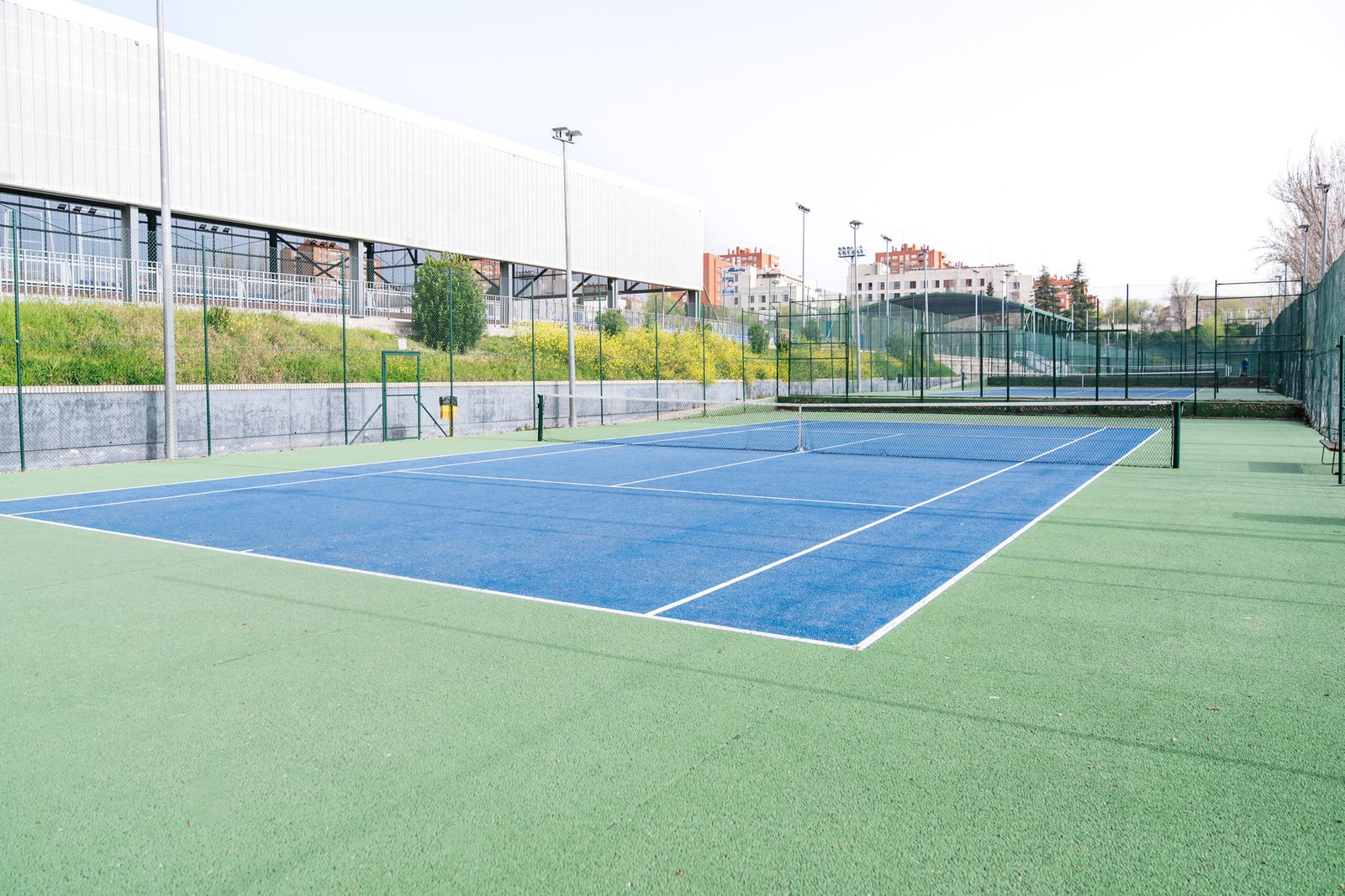 empty-tennis-court-with-blue-and-green-surface-in-2024-09-03-20-35-12-utc