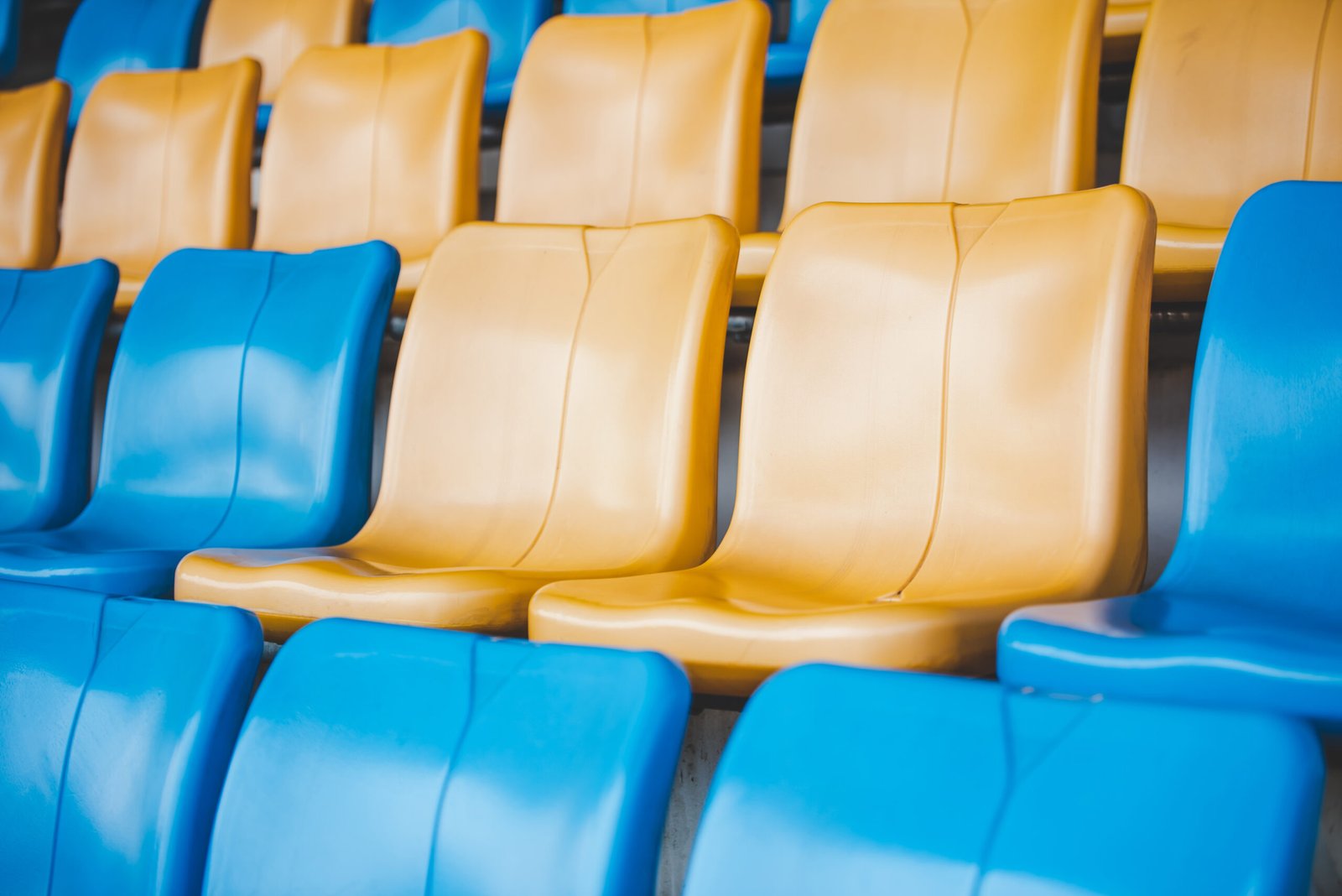 rows-of-plastic-seats-on-a-grandstand-chair-in-a-2023-11-27-05-32-52-utc