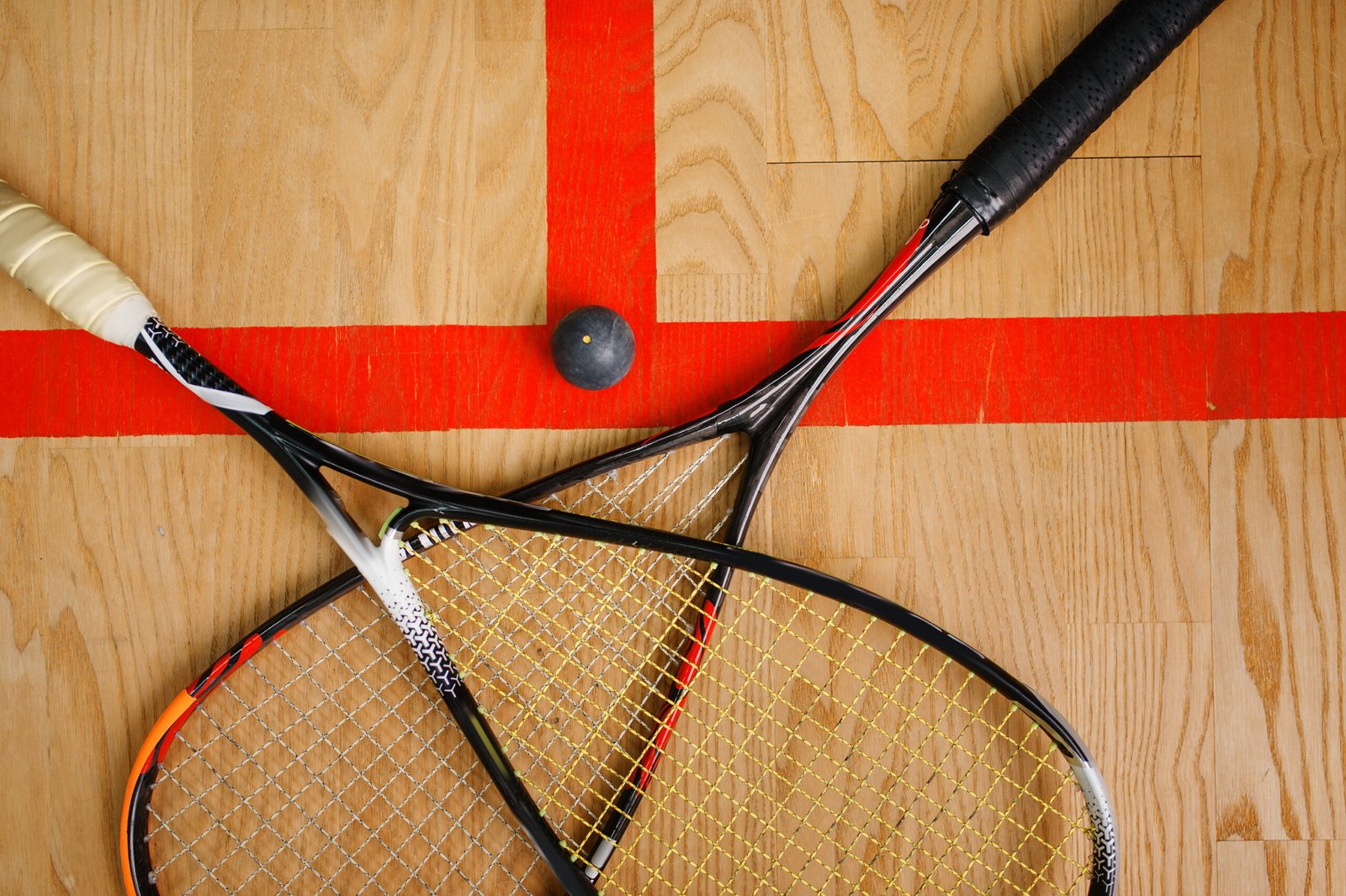 squash-rackets-and-ball-on-court-floor-top-view-2024-11-26-09-44-56-utc