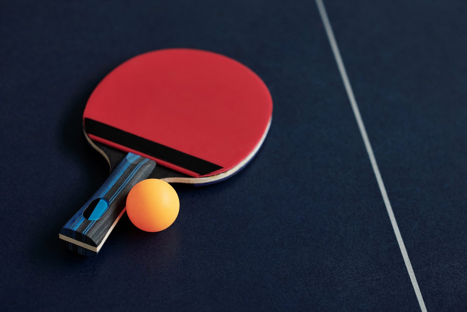 table-tennis-racket-and-ball-2023-11-27-05-25-10-utc